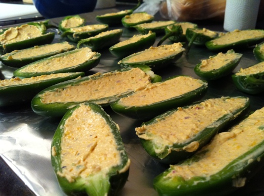 Filled jalapeños.  You can also add a little more filling so that it's slightly mounded on top; it won't spill over.
